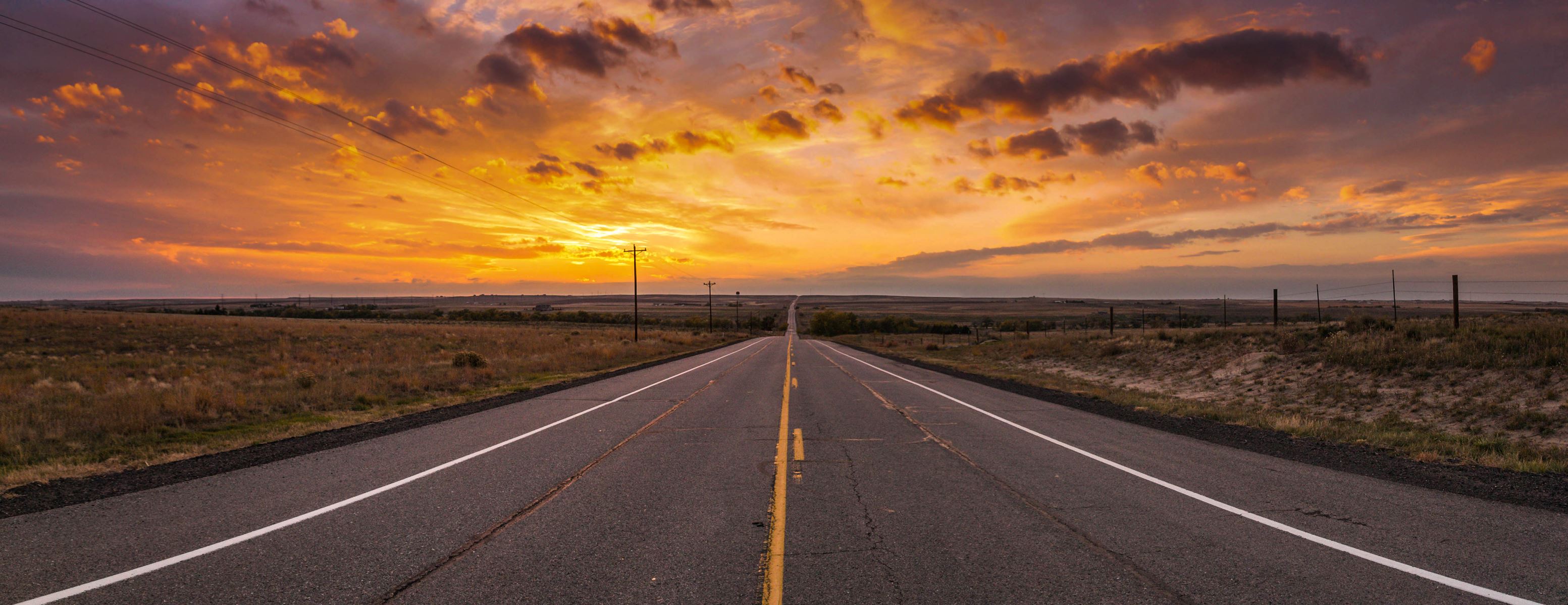 highway headed towards sunset